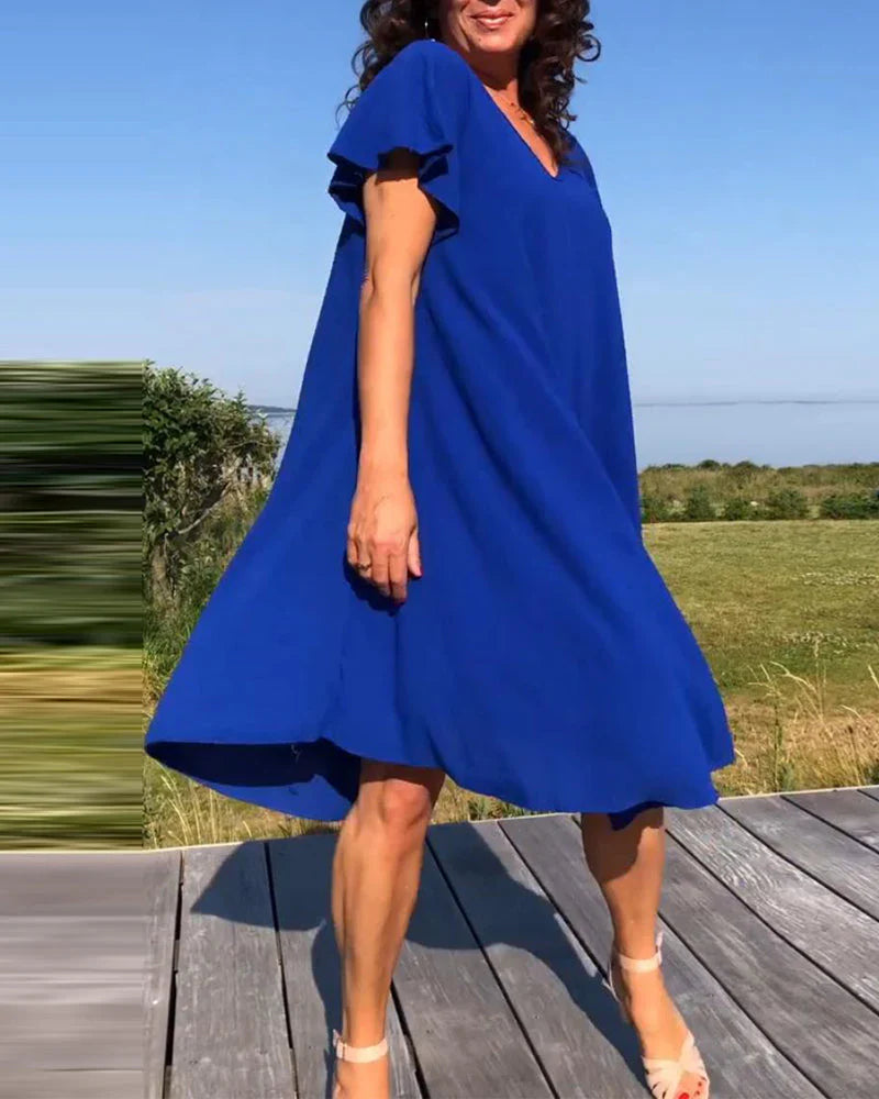 Lucinda – Elegant kjole med hætteærmer