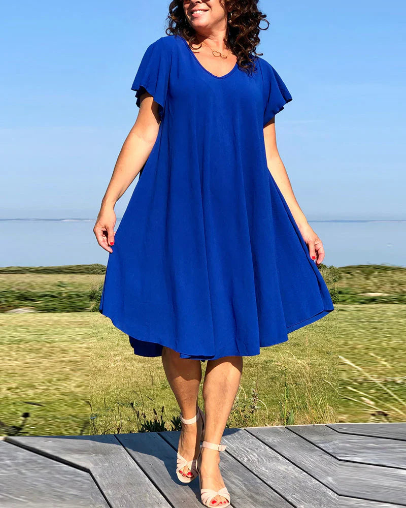 Lucinda – Elegant kjole med hætteærmer