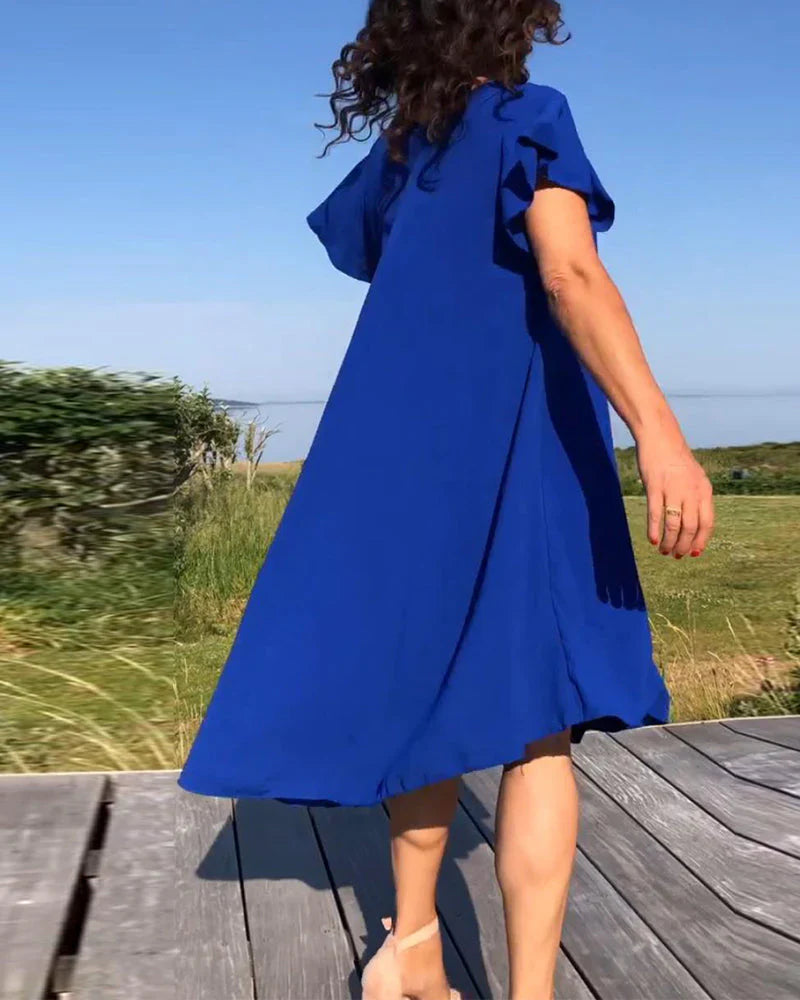 Lucinda – Elegant kjole med hætteærmer